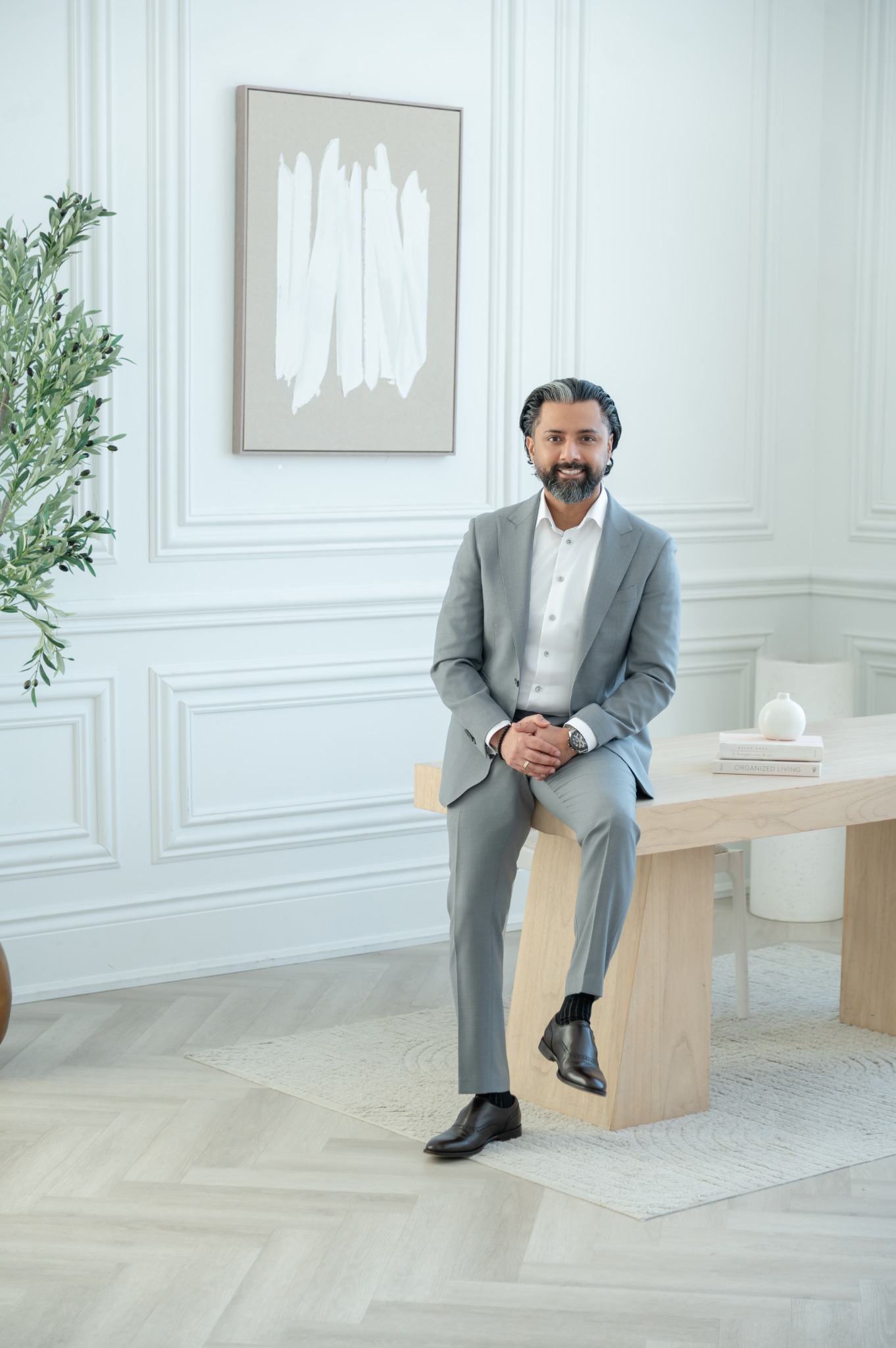 Ajit Saul in a light grey suit